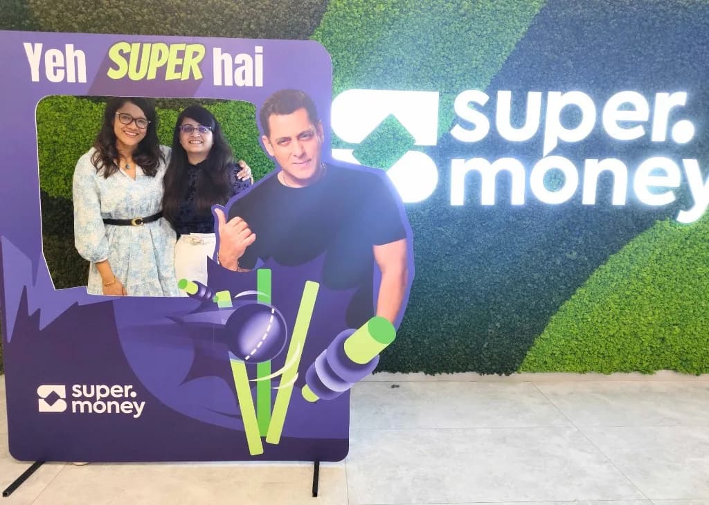 Team posing with the Yeh SUPER hai frame