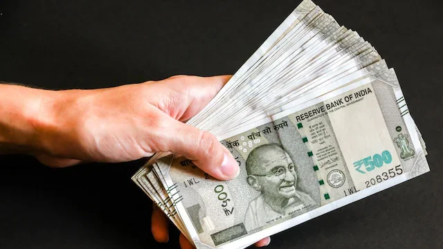 Stack of Indian rupee notes — CNBC-TV18 coverage of superSpends 2025